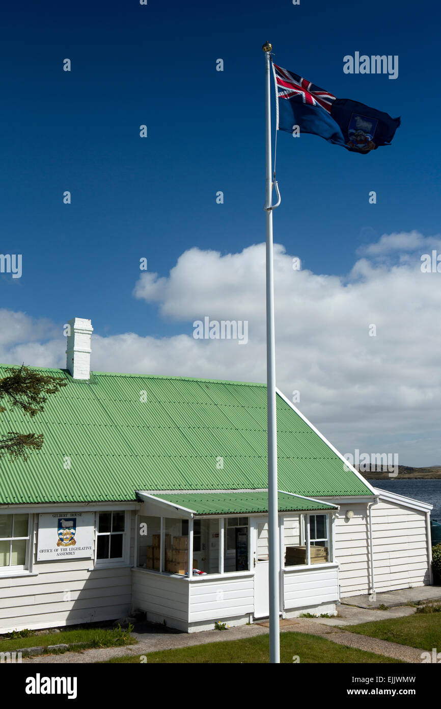 Falklands, Port Stanley, Falkland Islands flag flying outside Gilbert House, Legislative Assembly Office Stock Photo