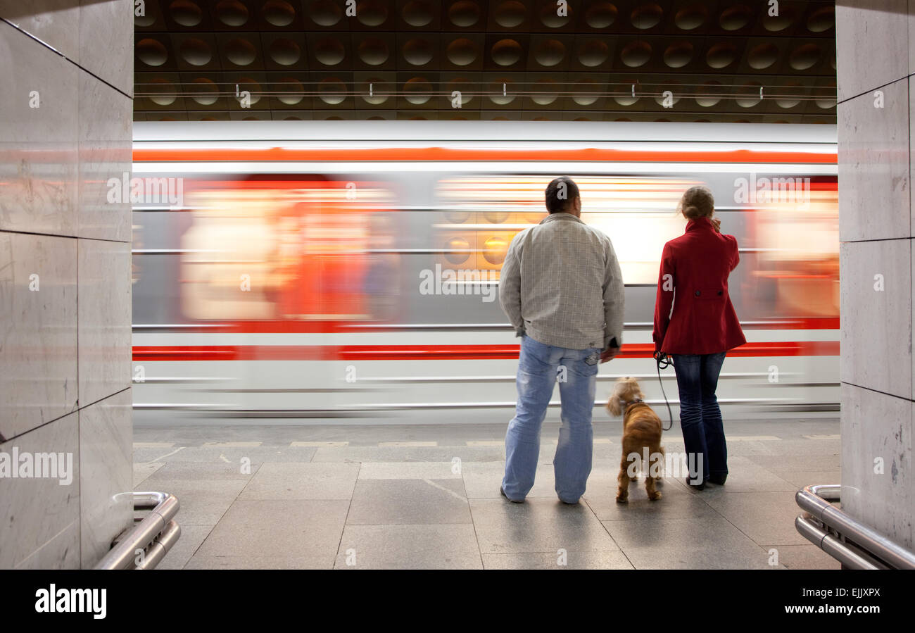 Trains and commuters on the Prague Metro in the Czech Republic Stock Photo
