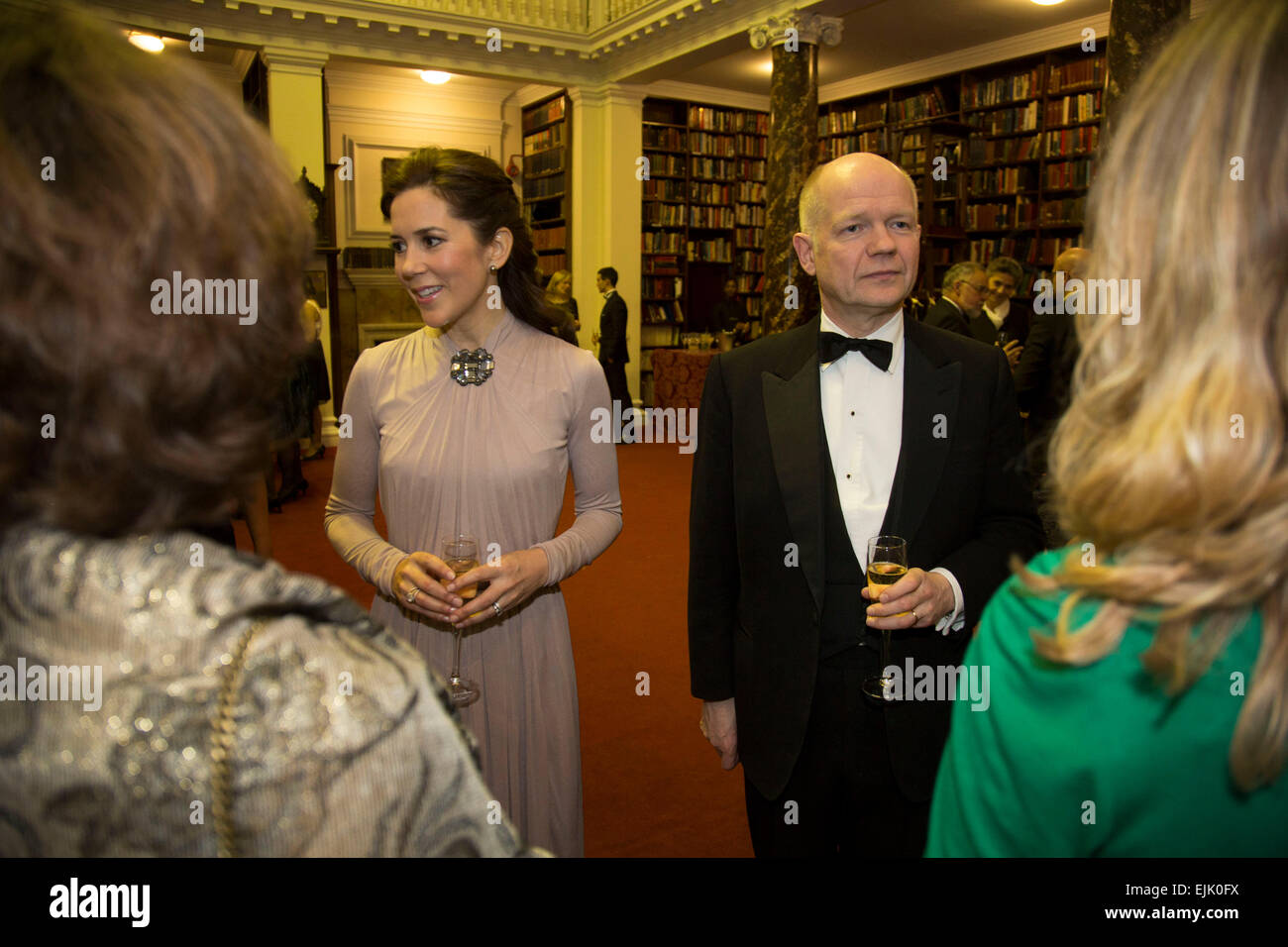 London, UK. Thursday 12th March 2015. International Centre for Research on Women, Champions for Change Awards Dinner event at Banqueting House, Whitehall. HRH Crown Princess Mary and William Hague meet and chat with VIP guests drinks reception in the RUSI library. Stock Photo