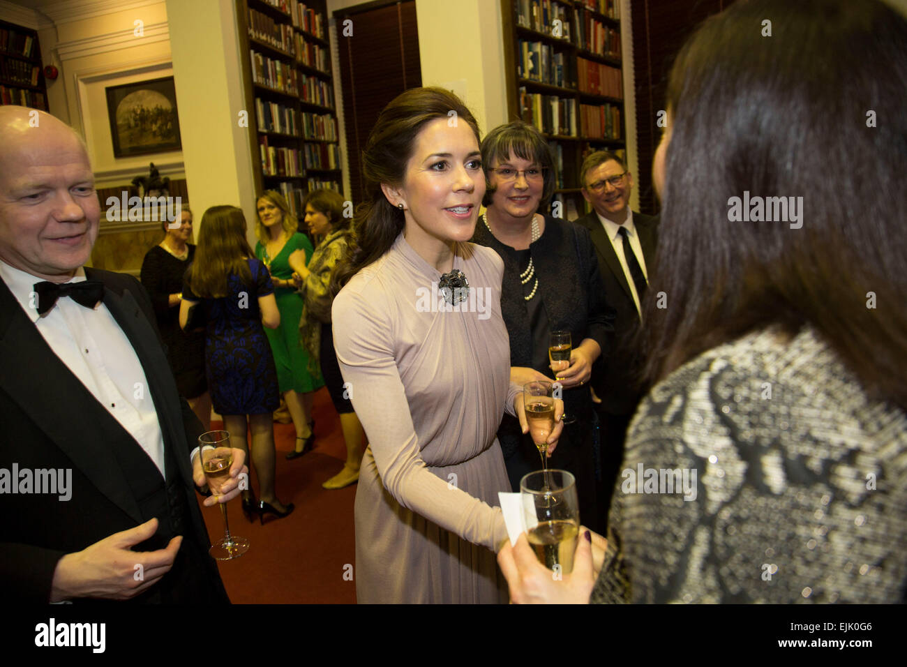 London, UK. Thursday 12th March 2015. International Centre for Research on Women, Champions for Change Awards Dinner event at Banqueting House, Whitehall. HRH Crown Princess Mary and William Hague meet and chat with VIP guests drinks reception in the RUSI library. Stock Photo