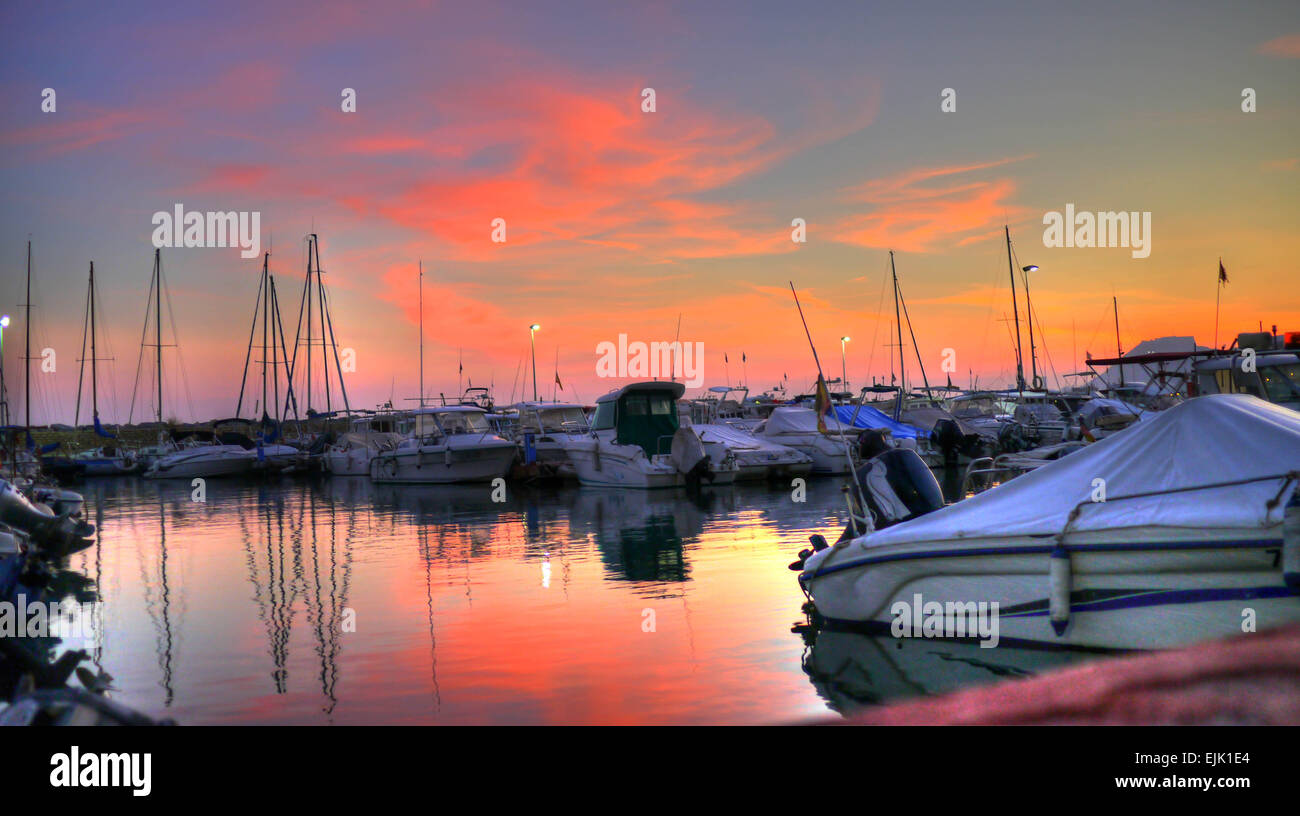 Fishing boats in a small harbour outside Alicante, Spain Stock Photo