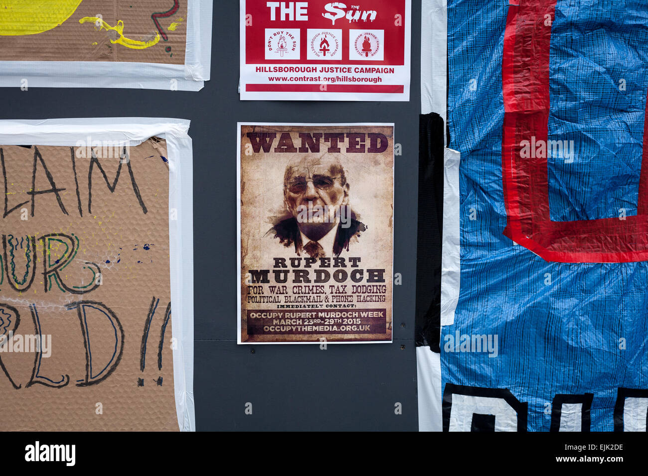 London, UK. 28th March, 2015. An anti-Rupert Murdoch poster is pictured