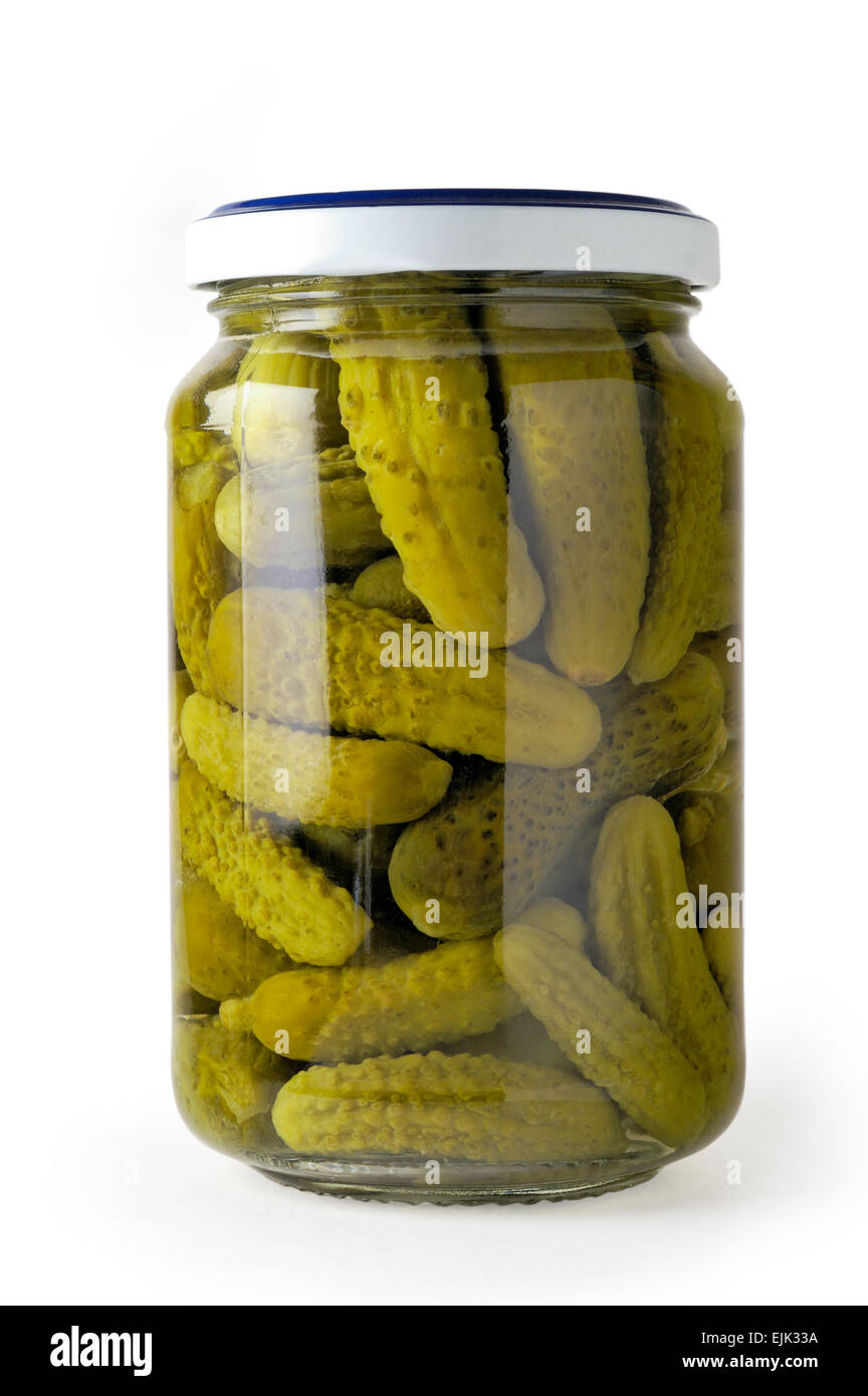Glass jar of preserved cucumbers Stock Photo