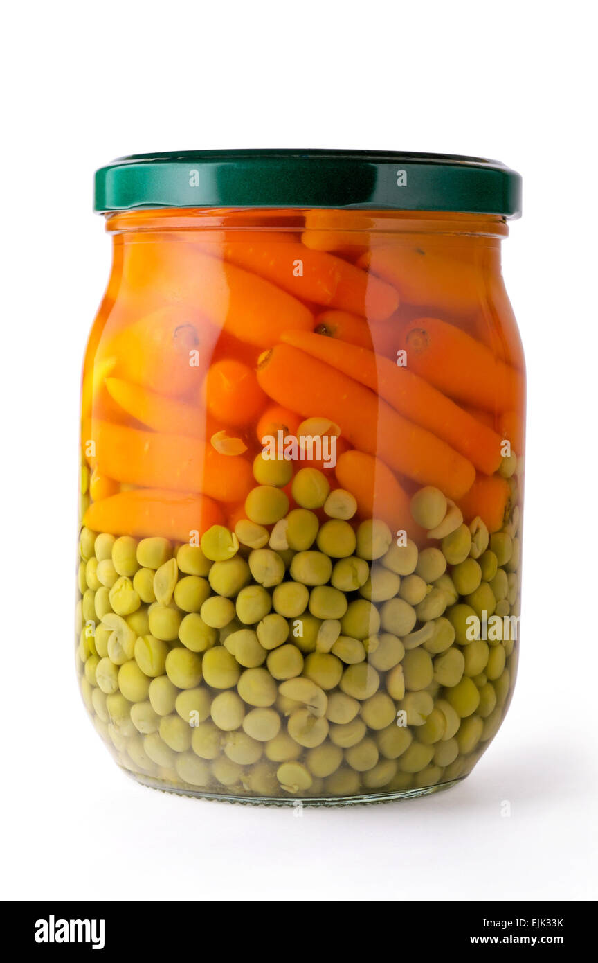 Glass jar of preserved peas and carrots  (vertical closeup) Stock Photo