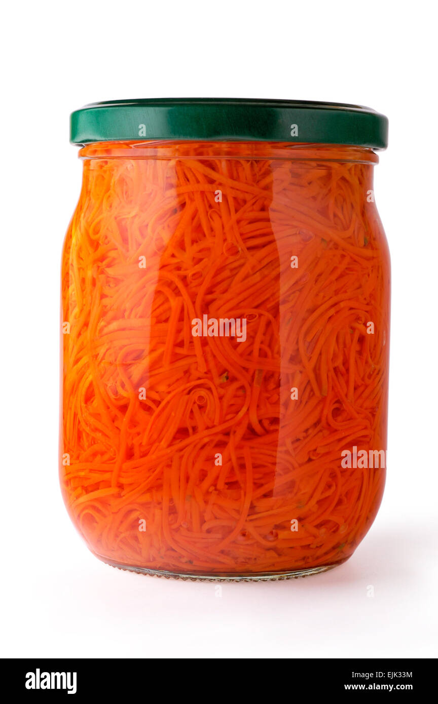 Glass jar of preserved julienne carrots Stock Photo