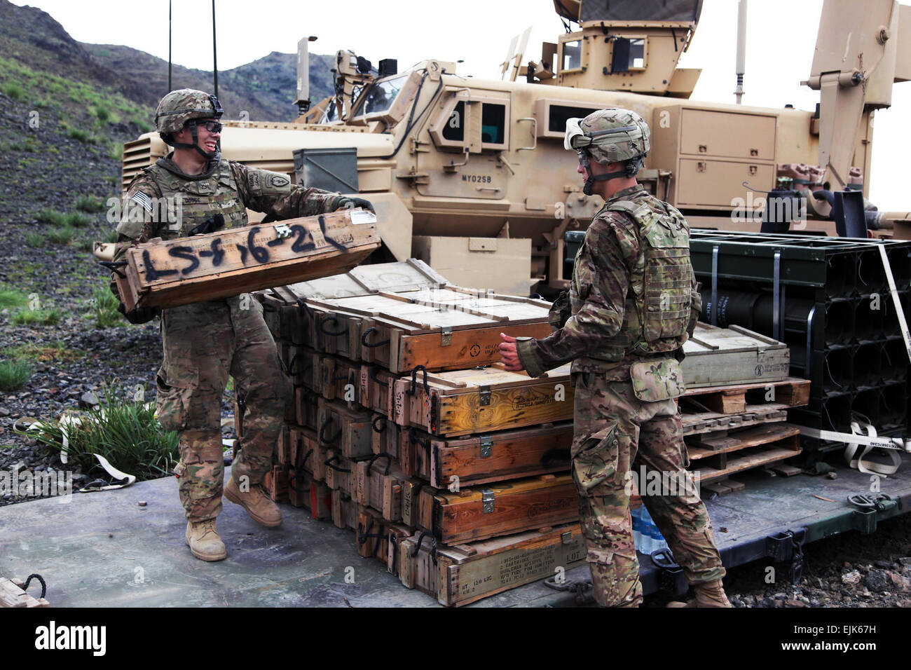 U.S. Soldiers assigned to 706th Explosive Ordinance Disposal EOD Company, Task Force 4-25, load empty ordinance boxes onto a truck at the demolition range on Forward Operating Base Salerno, Khost province, Afghanistan, Sept. 2, 2012. EOD Soldiers disposed of ordinance and equipment that was determined to be unusable.  Sgt. Kimberly Trumbull Stock Photo