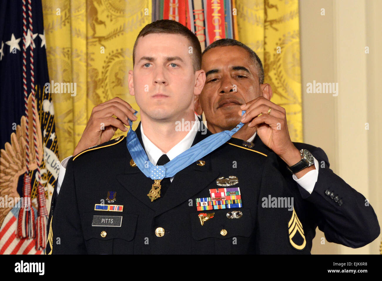 President Barack Obama awards the Medal of Honor to former U.S. Army Staff Sgt. Ryan M. Pitts, the White House, Washington, D.C., July 21, 2014. Pitts received the nation's highest military honor for his actions in 2008 in Wanat, Afghanistan, with 2nd Platoon, Chosen Company, 2nd Battalion Airborne, 503rd Infantry Regiment, 173rd Airborne Brigade.   Army News Service photo by Lisa Ferdinando  /medalofhonor/pitts/profile/index.html  /medalofhonor/pitts/profile/index.html Stock Photo