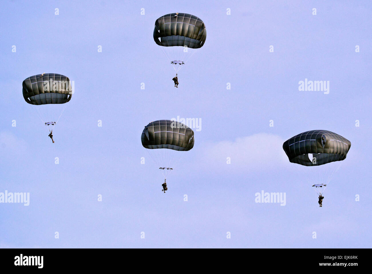 U.S. Army Soldiers, assigned to 173rd Infantry Brigade Combat Team Airborne, conduct a combat training jump with T-11 parachutes from a C-130 Hercules at the 7th Army Joint Multinational Training Command's Grafenwoehr Training Area, Germany, Oct. 22, 2013. U.S. Army  Visual Information Specialist Gertrud Zach Stock Photo