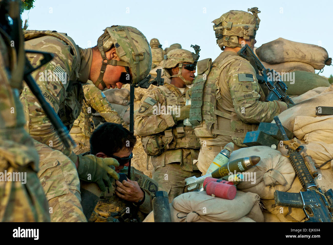 U.S. Army Soldiers consolidate rounds and watch for enemy activity ...