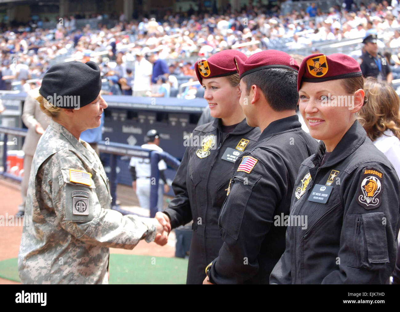 Gen. Ann E. Dunwoody, commander, U.S. Army Materiel Command, speaks with members of the U.S. Army Parachute Team, the Golden Knights, at Yankee Stadium prior to the Army Appreciation Game June 14. The Golden Knights jumped into the stadium, and Gen. Dunwoody threw out the first pitch to start the game in celebration of the Army's 234th Birthday. photo by Sgt. 1st Class Richard A. Guzman, New York City Recruiting Battalion Stock Photo