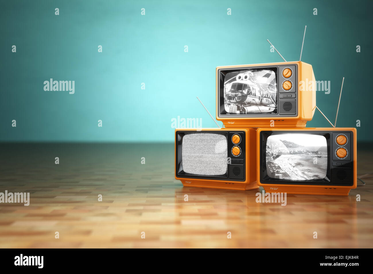 Vintage television concept. Stack of retro tv set on green background. 3d Stock Photo