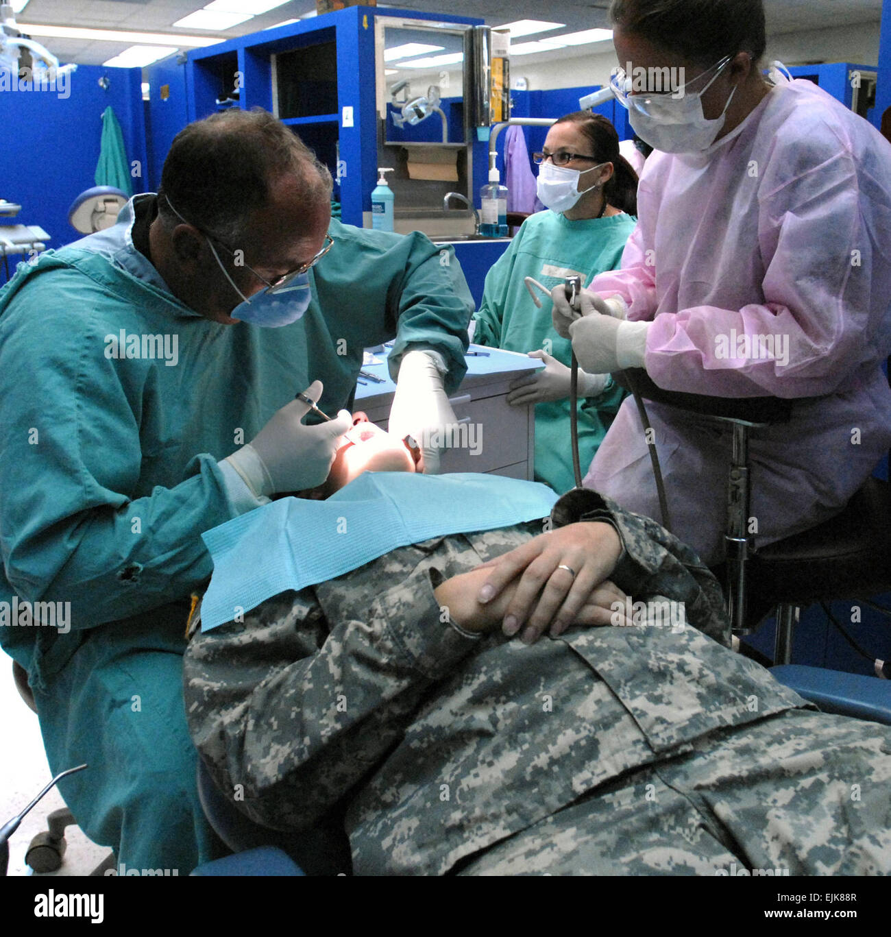 U.S. Air Force Maj. Matthew Sands and Staff Sgt. Lacy Summy perform a