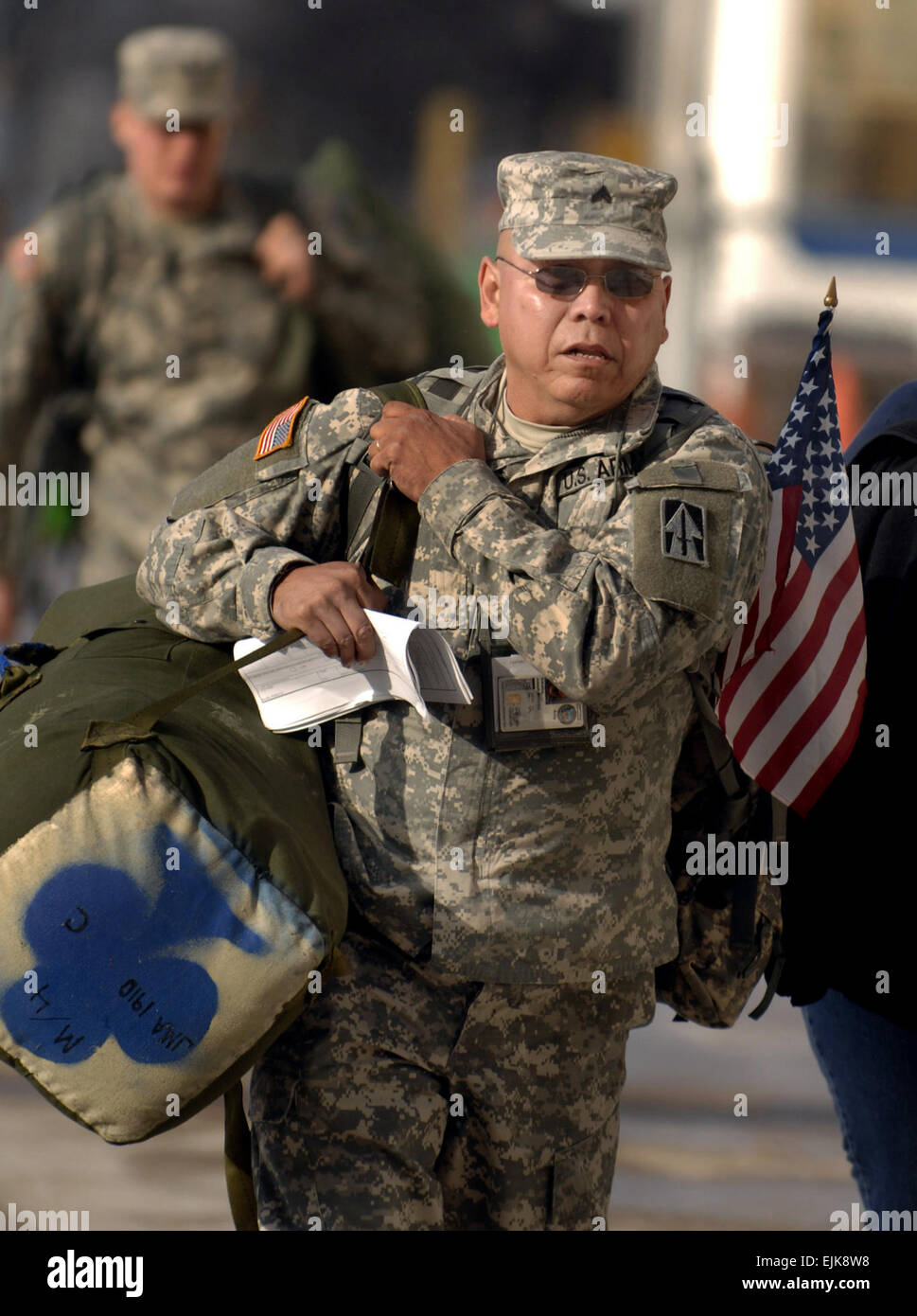 U.S. Army Cpl. Joseph Arevalos, of the 76th Brigade Combat Team, makes his way inside for a going away ceremony Jan. 2, 2008, at the RCA Dome in Indianapolis, Ind. The Indiana National Guard is preparing to deploy its largest amount of Soldiers since World War II with more than 3,400 Soldiers scheduled to depart for Iraq to serve during their 12-month rotation.  Staff Sgt. Russell Klika Stock Photo
