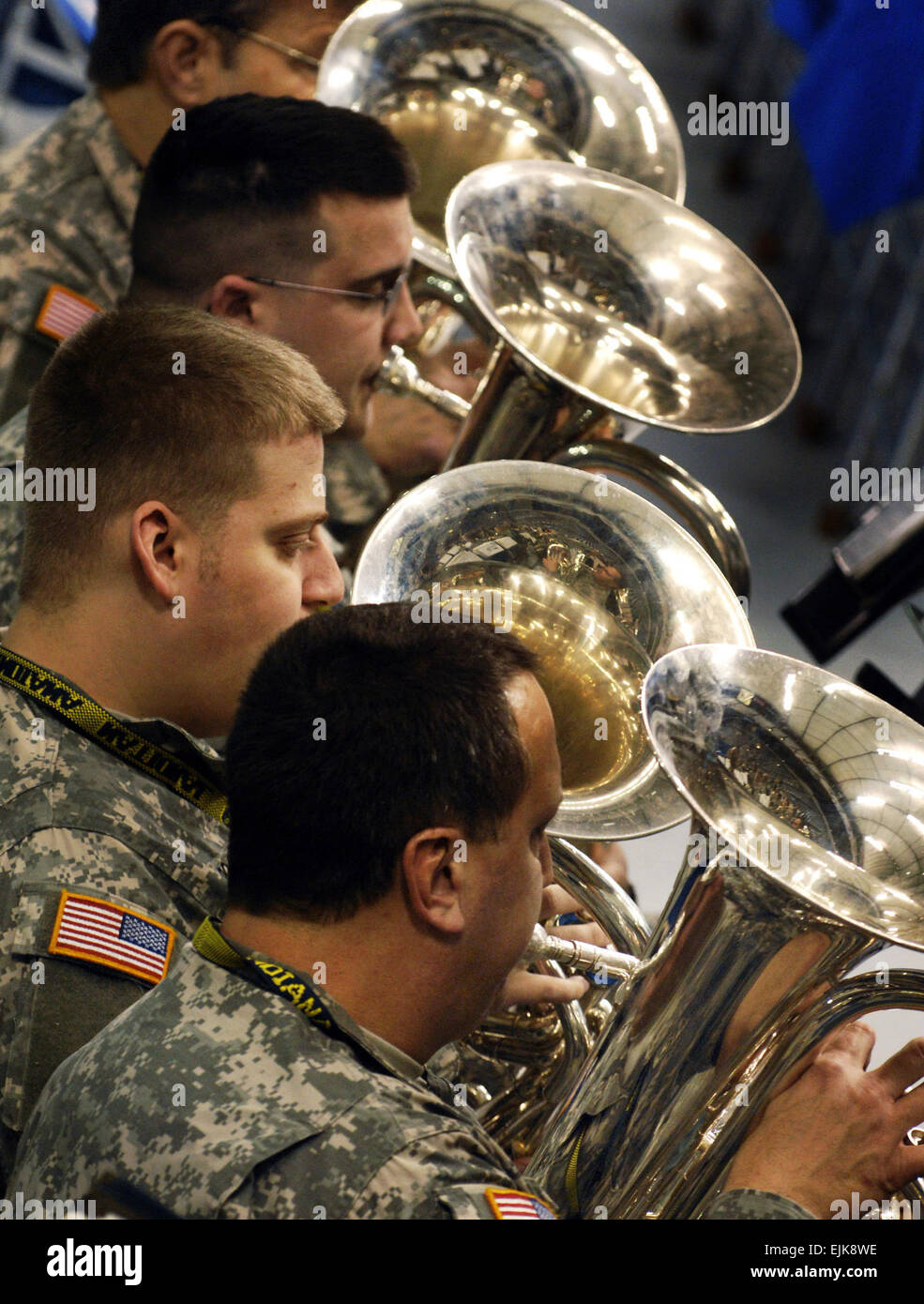U.S. Army Soldiers from the 38th Infantry Division Band perform during a going away ceremony for fellow Soldiers at the RCA Dome in Indianapolis, Ind. The Indiana National Guard is preparing to deploy its largest amount of Soldiers since World War II with more than 3,400 Soldiers scheduled to depart for Iraq to serve during their 12-month rotation.  Staff Sgt. Russell Klika Stock Photo
