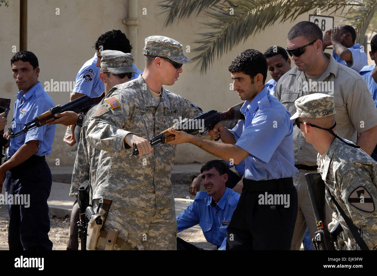 U.S. Army Soldiers from 1st Battalion, 7th Cavalry Regiment 1st Brigade Combat Team, 1st Cavalry Division train new Iraqi police officers on basic police skills as part of the Iraqi Police Prep Course on Taji, Iraq, Oct. 25, 2007.  Senior Airman Steve Czyz Stock Photo