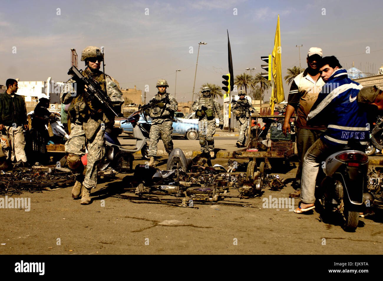 U.S. Army Soldiers assigned to 3rd Platoon, Charlie Company, 1st Battalion, 504th Parachute Infantry Regiment patrol Rusafa, Baghdad, Iraq, Feb. 17, 2008.  Staff Sgt. Jason T. Bailey Released Stock Photo