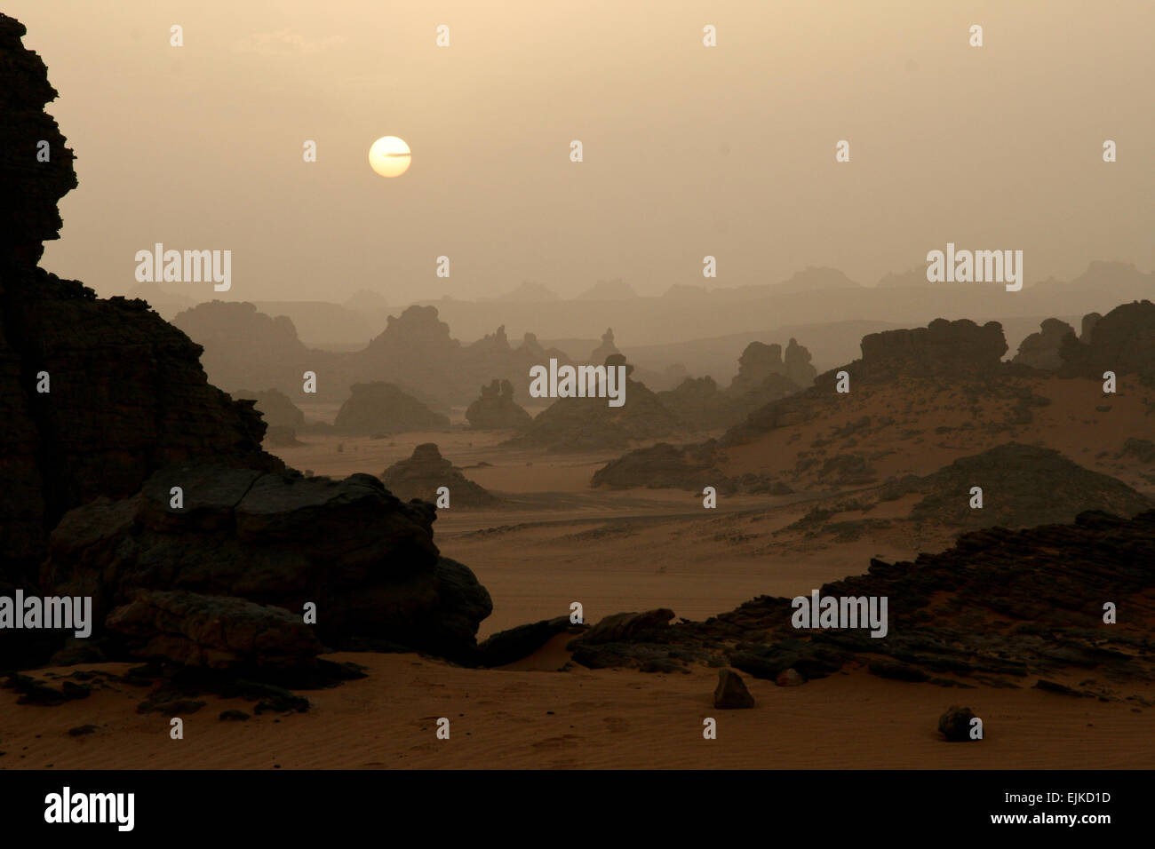 Sunset over the Acacus Mountains in the Libyan Sahara Stock Photo