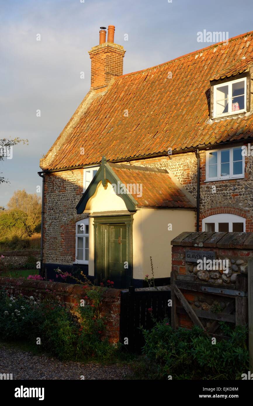 traditional north Norfolk flint and brick farmhouse with porch