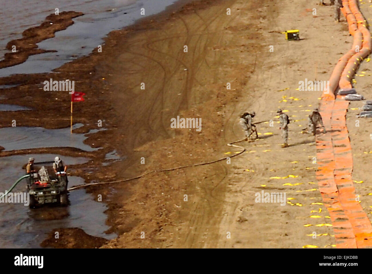 Interlocking Water Soldiers of the Louisiana National Guard continue constructing the ...