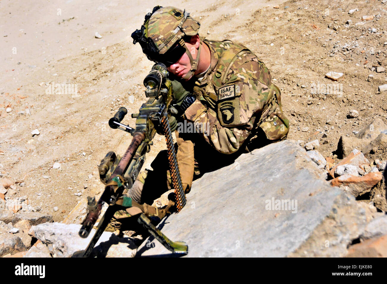 U.S. Army Spc. Christopher Newell scans the area while training to maintain his tactical skills as a member of a quick reaction force on Jalalabad Airfield in Afghanistan's Nangarhar province, June 7, 2013. Newell, an M240B gunner, is assigned to the 101st Airborne Division's Company C, 1st Battalion, 327th Infantry Regiment, 1st Brigade Combat Team. As of June 18, 2013, Afghan forces have taken the lead in providing security for their country.  Sgt. 1st Class John D. Brown Stock Photo