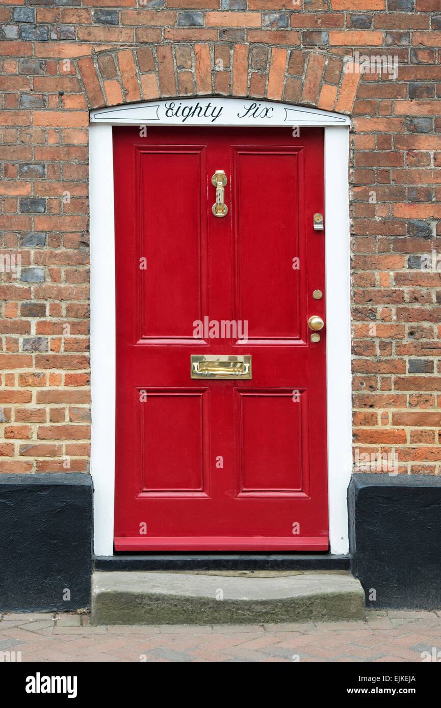 Red cottage front door. UK Stock Photo