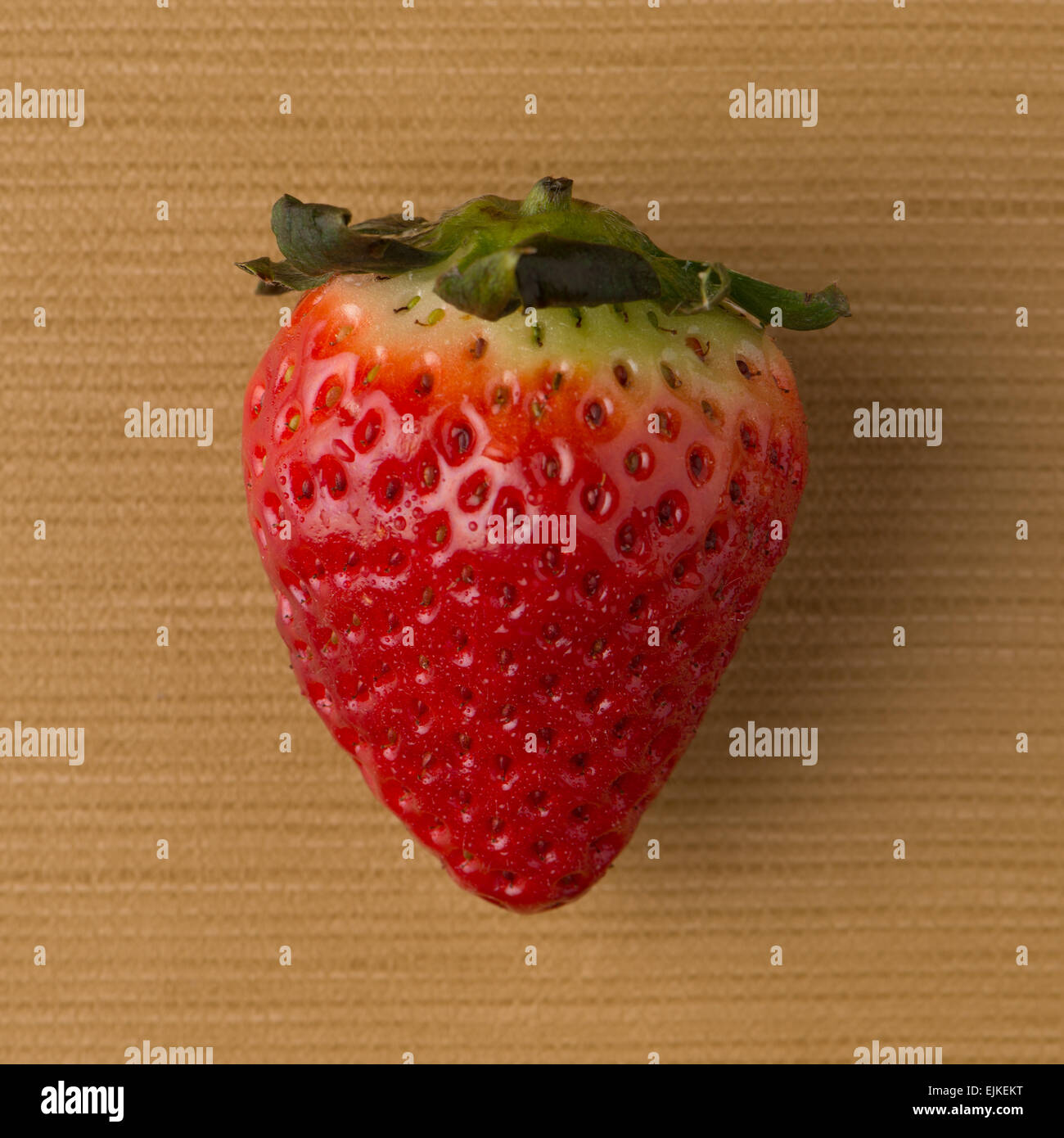 Fresh strawberry on a yellow vinyl background Stock Photo - Alamy