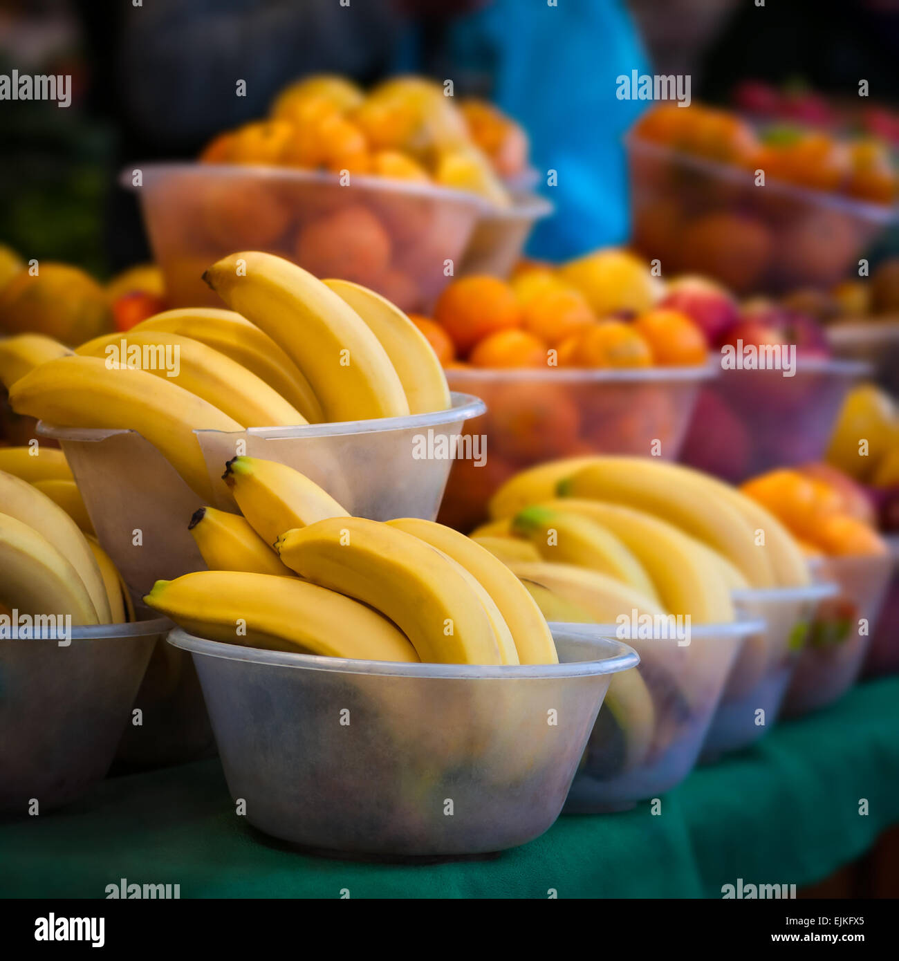 Outdoor farmer's market selling fruit in bowls. Stock Photo