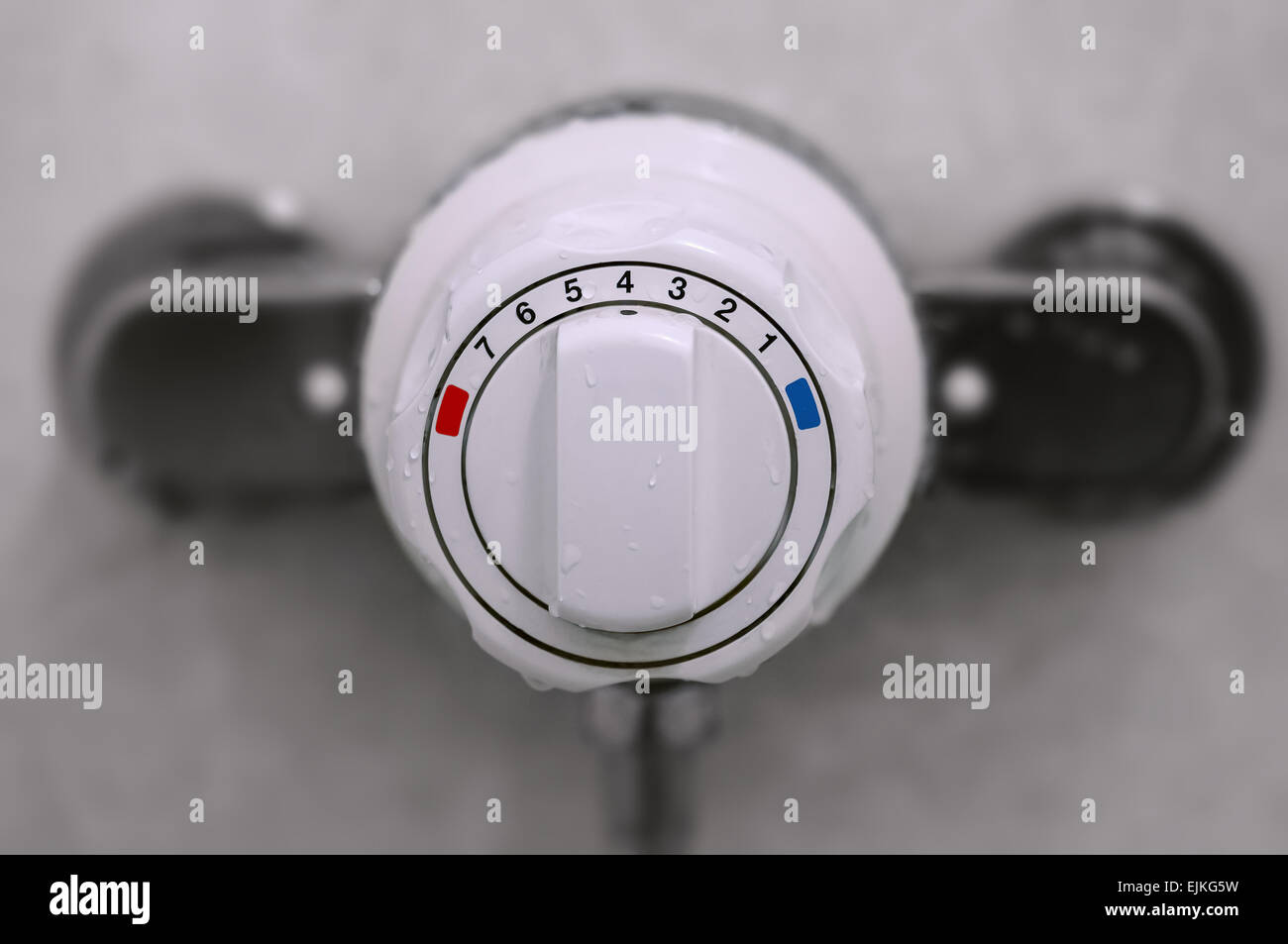 Shower thermostatic power and heat controller close up Stock Photo