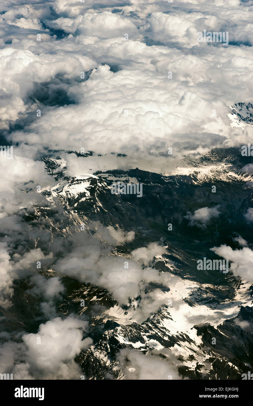 Above aerial plane view of Italian alps and cloudscape Stock Photo - Alamy