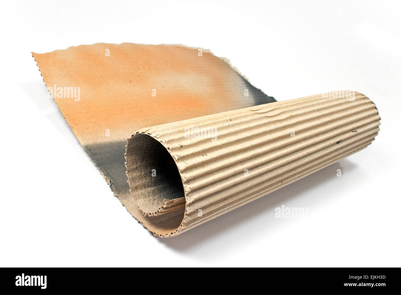 Torn corrugated cardboard isolated on white Stock Photo