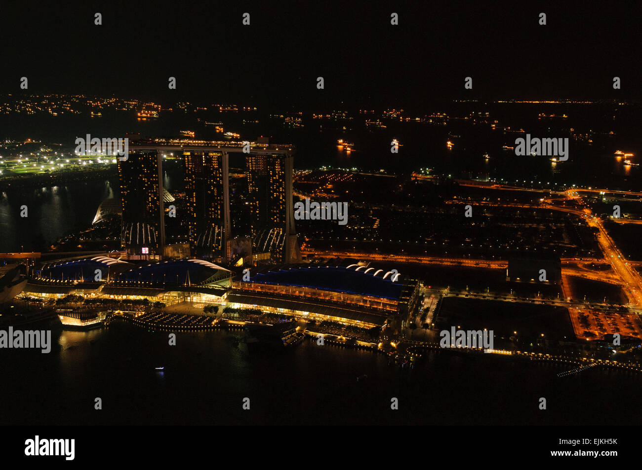 Singapore Marina Bay Sands and Singapore harbour at night. Stock Photo