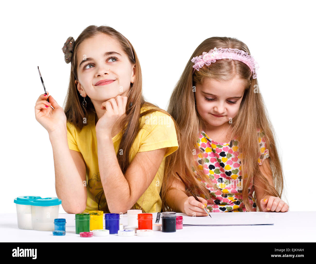 girls painting together Stock Photo