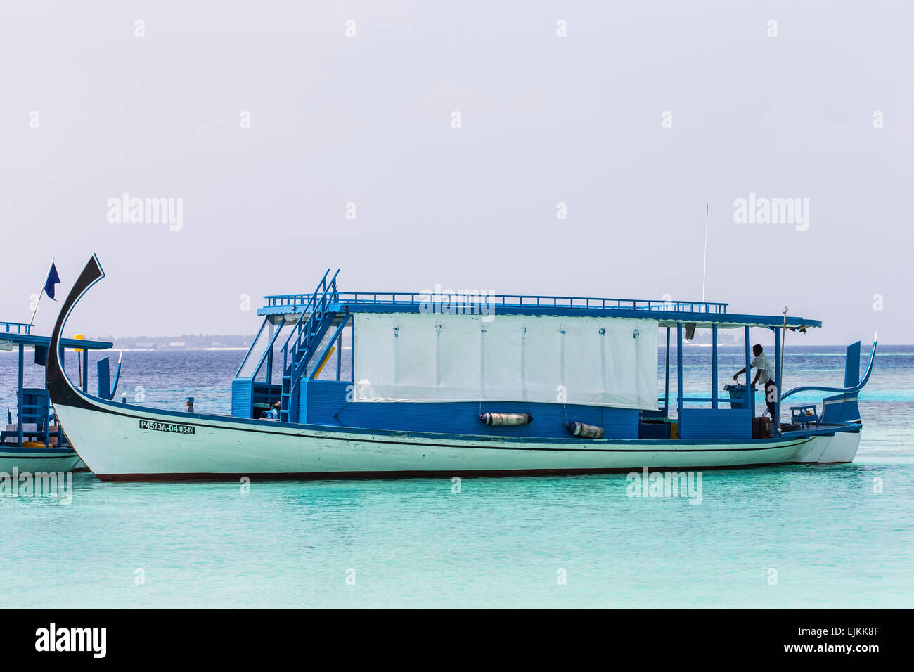 A Dhoni boat coming in to moor up at Makunudu in the Maldives Stock Photo