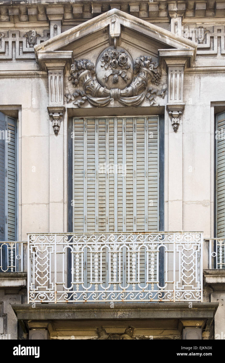 An ornate window with wrought iron balcony in the town of Chagny, Saone et Loire, Burgundy, France. Stock Photo