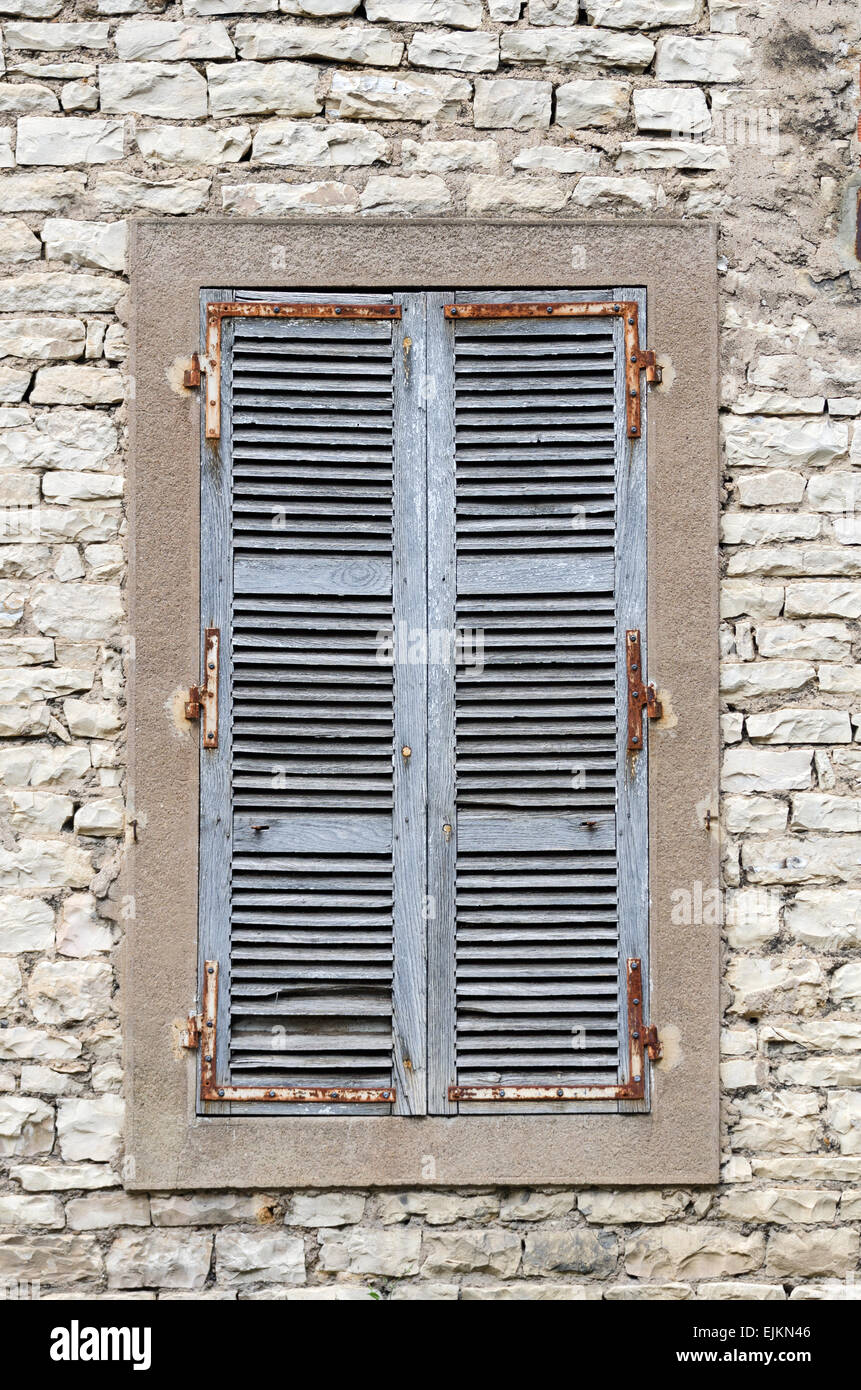A picturesque, shuttered window in the town of Chagny, Saone et Loire, Burgundy, France. Stock Photo