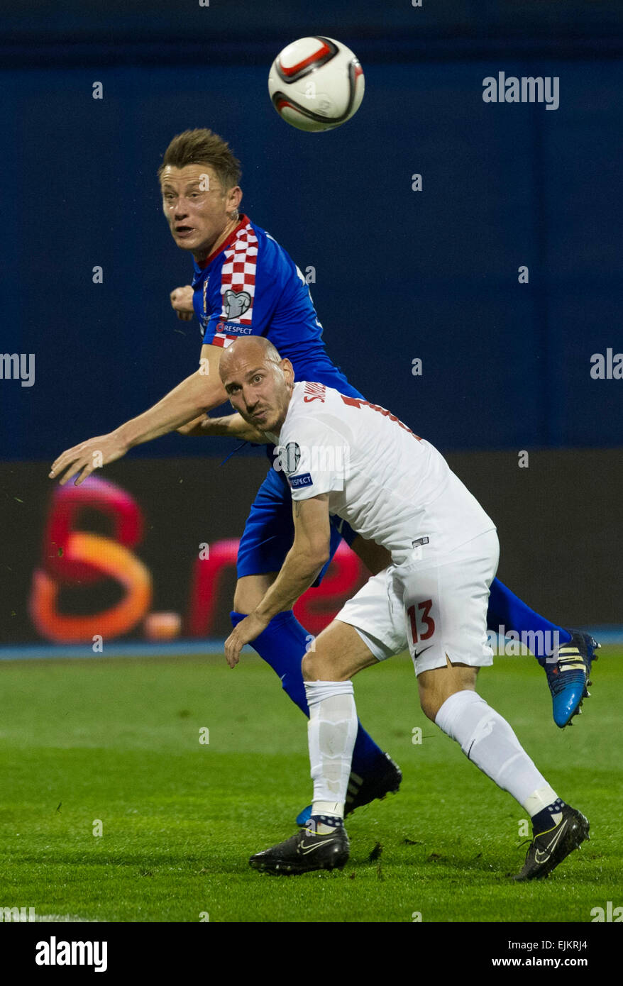 Zagreb, Croatia. 28th Mar, 2015. Ivica Olic (L) of Croatia vies with Jone Samuelsen of Norway during their UEFA Euro 2016 Group H qualifying match at Maksimir stadium in Zagreb, capital of Croatia, March 28, 2015. Croatia won 5-1. Credit:  Miso Lisanin/Xinhua/Alamy Live News Stock Photo