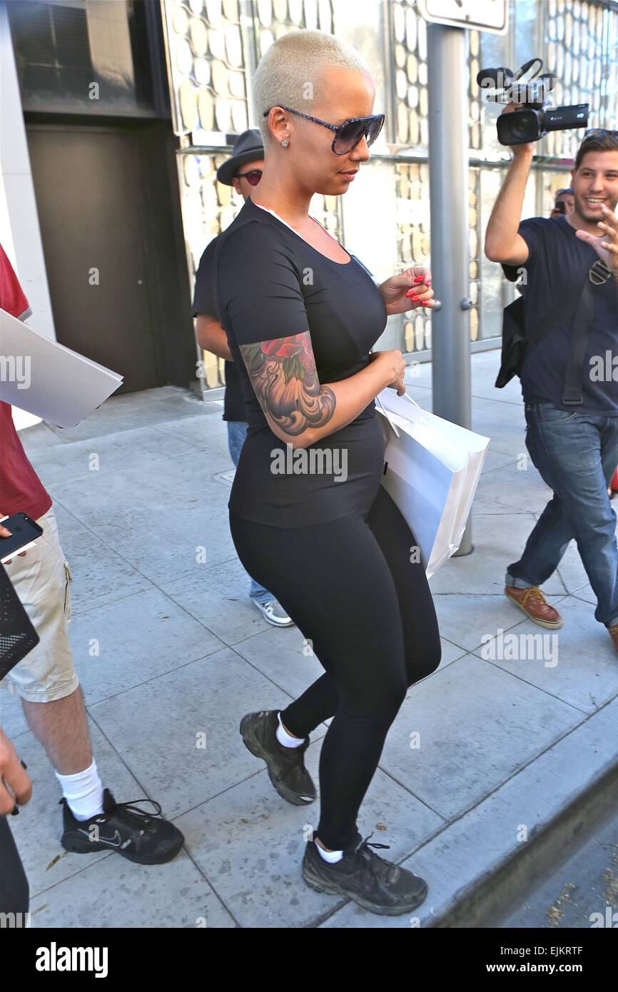 Amber Rose shops at Wolford in Beverly Hills wearing black leotards