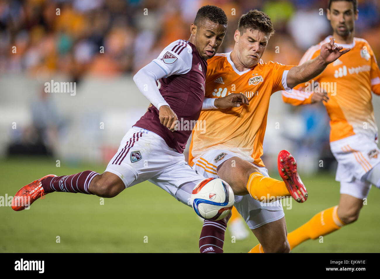 Houston, Texas, USA. 28th Mar, 2015. Colorado Rapids forward Gabriel Torres (10) attempts to score as Houston Dynamo defender David Horst (18) blocks the shot during an MLS game between the Houston Dynamo and the Colorado Rapids at BBVA Compass Stadium in Houston, TX on March 28th, 2015. The game ended in a 0-0 draw. Credit:  Trask Smith/ZUMA Wire/Alamy Live News Stock Photo