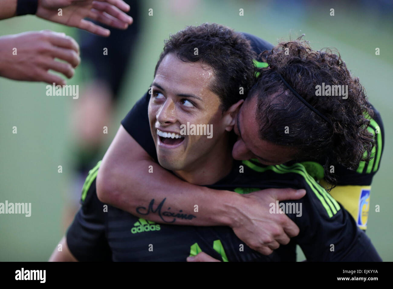 California, USA. 28th Mar, 2015. Mexico's Javier Hernandez (L) celebrates his goal during the international friendly match, against Ecuador, held in the Los Angeles Memorial Coliseum, in Los Angeles city, California state, the United States, on March 28, 2015. Mexico won 1-0. Credit:  Omar Vega/NOTIMEX/Xinhua/Alamy Live News Stock Photo