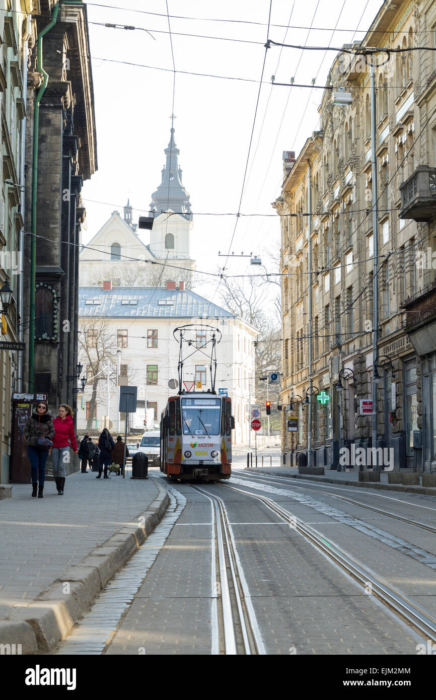 Lviv , Ukraine - March 21, 2015 : Tram in the Old Town . Lviv is the largest city in western Ukraine . Stock Photo