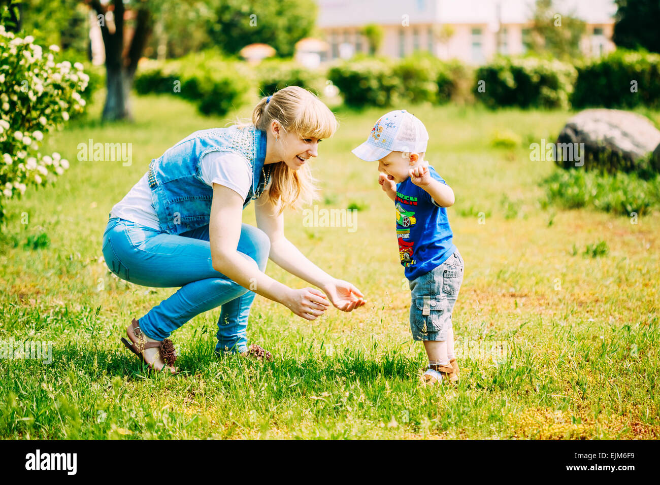 Happy Little Boy Child Running On Summer Green Grass Meadow, Park