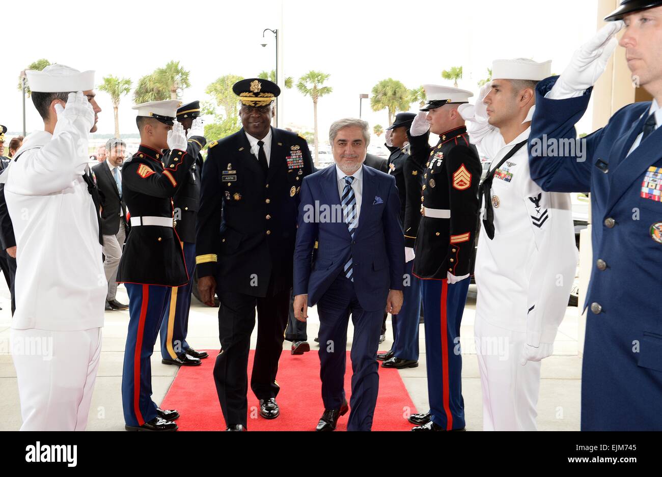 US Central Command Commander Gen. Lloyd J. Austin III escorts Afghan Chief Executive Dr. Abdullah Abdullah through an honor cordon on their way into the CENTCOM headquarters building March 27, 2015 in Tampa, Florida. Stock Photo