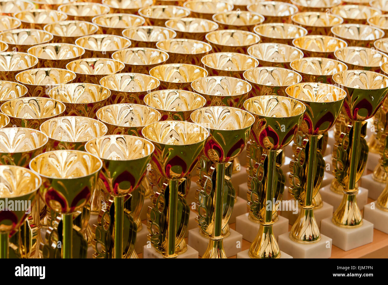 Group of small gilded plastic trophies Stock Photo
