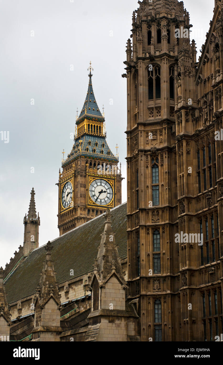 Big Ben rising next to the Houses of Parliament, London, England ...