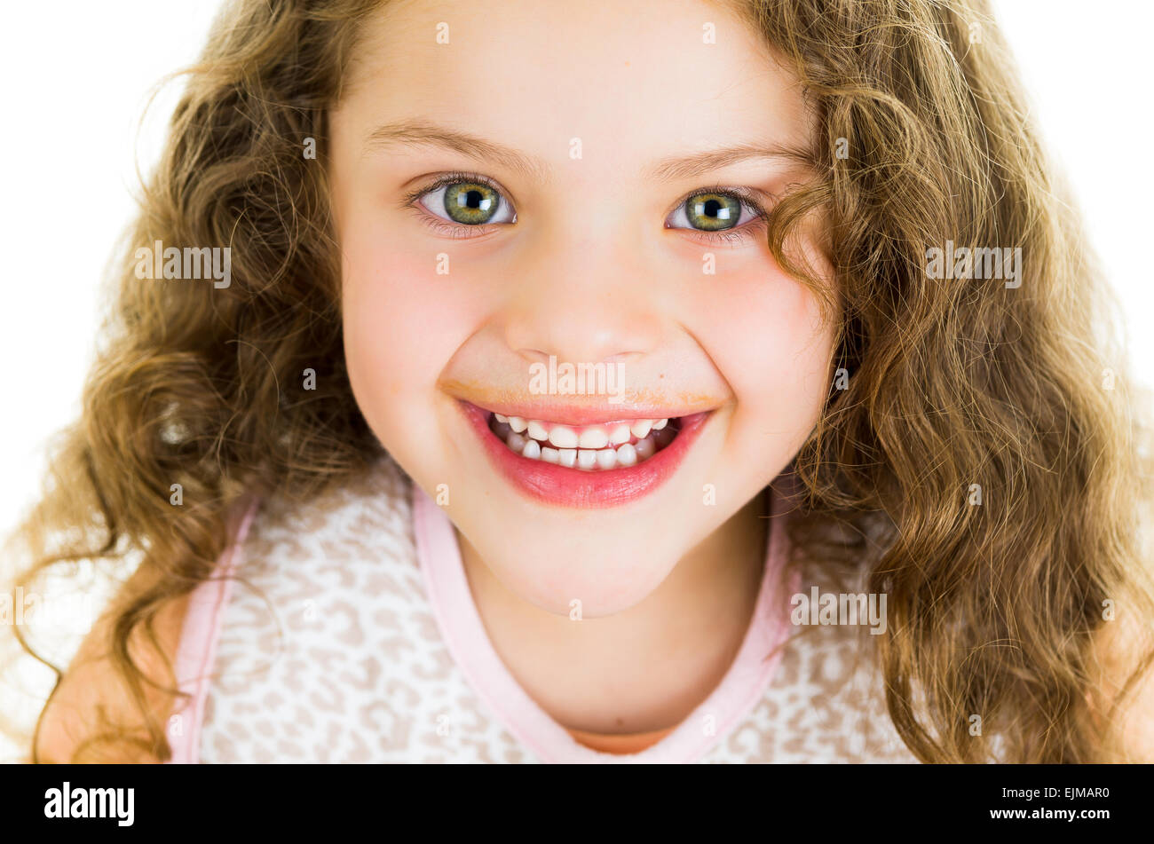 Cute little preschooler girl with chocolate milk mustache Stock Photo