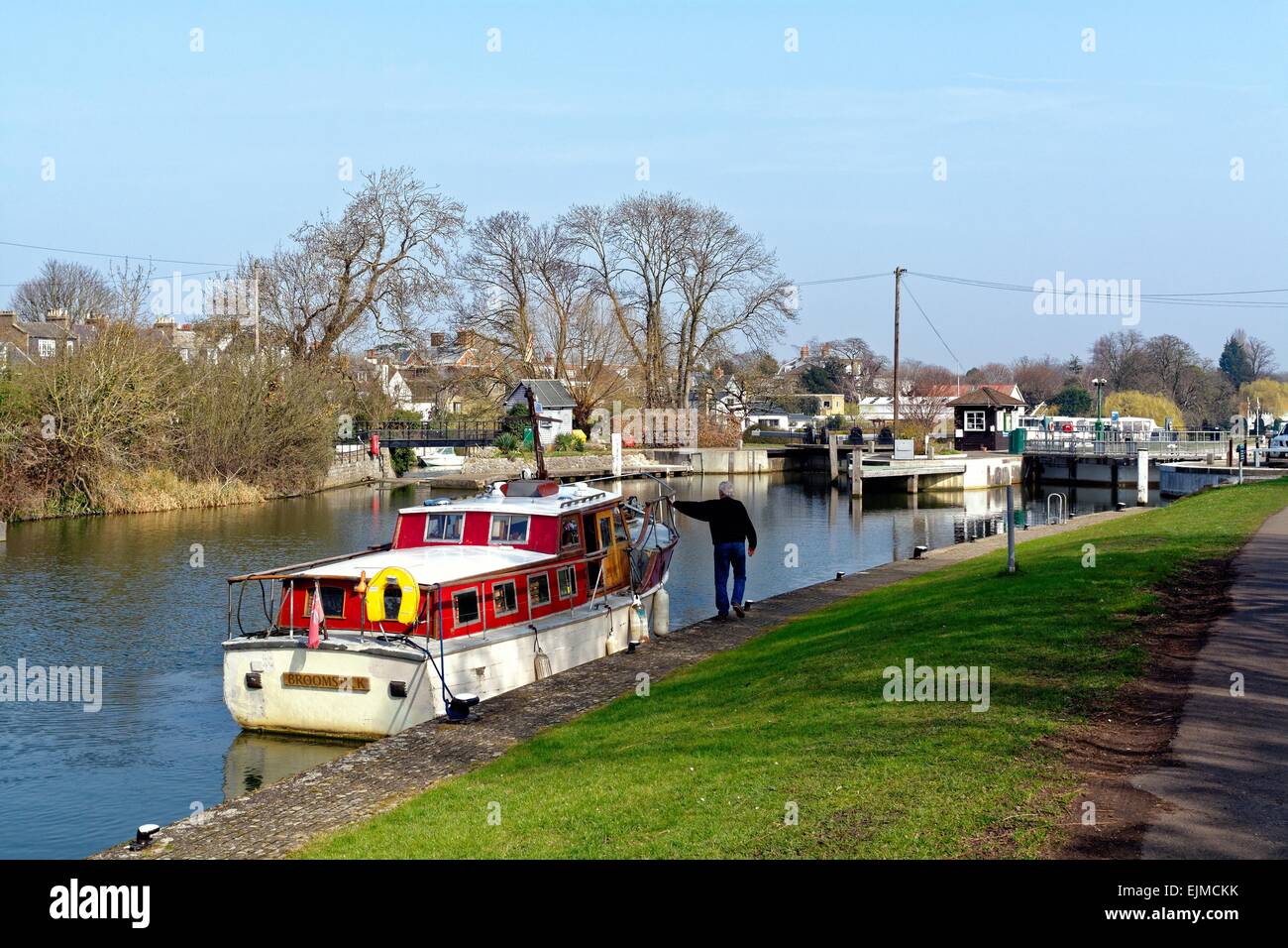 River Thames at Sunbury lock Surrey with moored cabin cruiser in ...