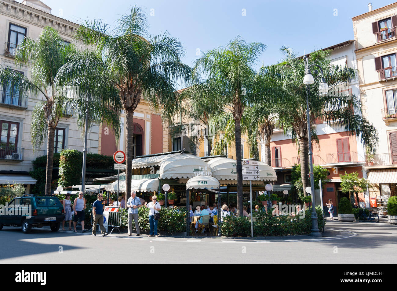 View of the Bar Ercolano in Piazza Tassa, Sorrento.  The bar is surrounded by a grove of queen palms, Syagrus romanzoffiana Stock Photo