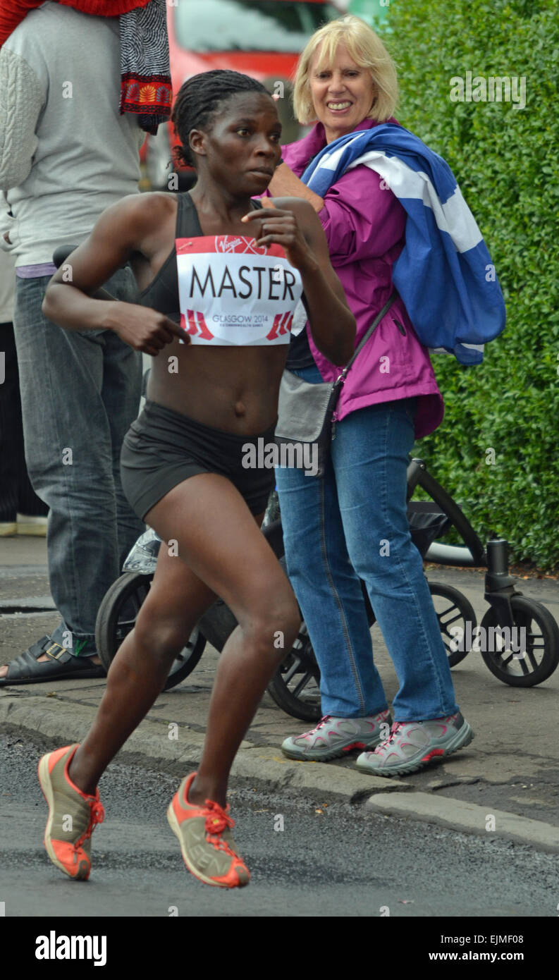 Tereza Master (Malawi) running the women's marathon at the Glasgow Commonwealth Games 2014 Stock Photo