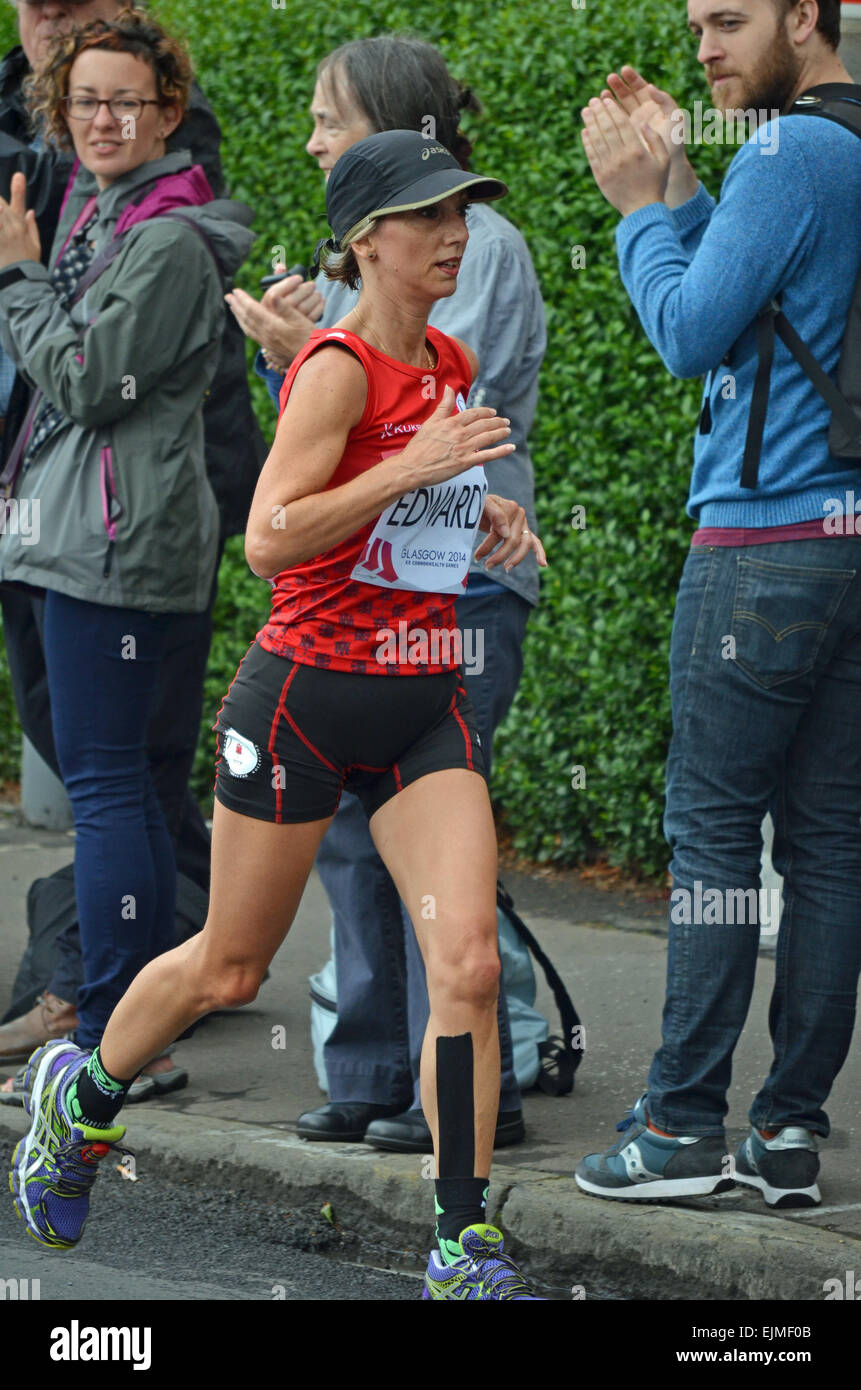Alison Edwards (Gibraltar) running the women's marathon at the Glasgow Commonwealth Games 2014 Stock Photo