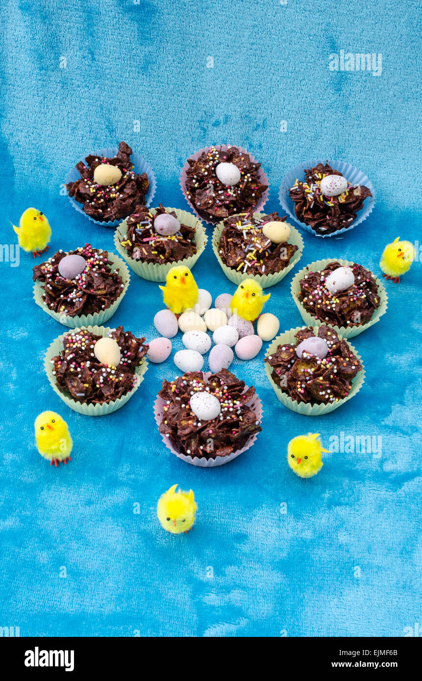 Collection of mini chocolate Easter eggs, cornflake cakes and baby